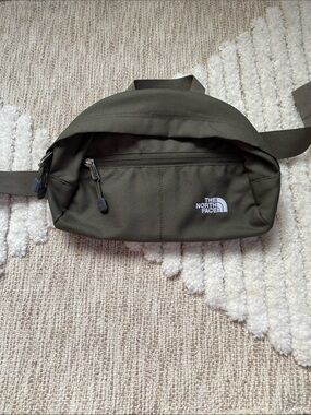 The North Face green waist bag